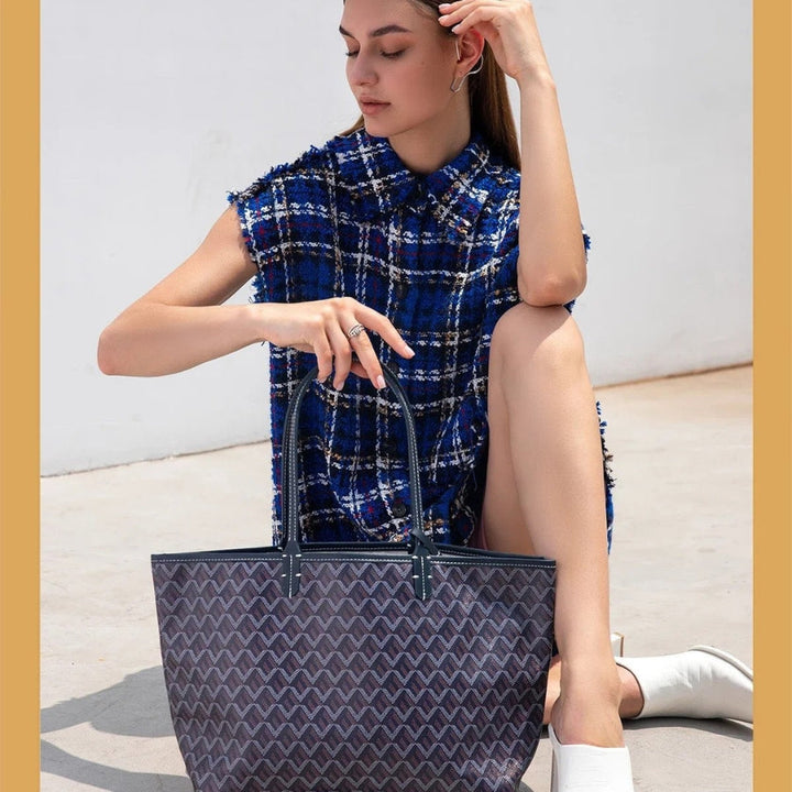 Tidløs elegant tote taske for kvinder. Stor kapacitet og stilfuldt design; en alsidig tilføjelse til garderoben.