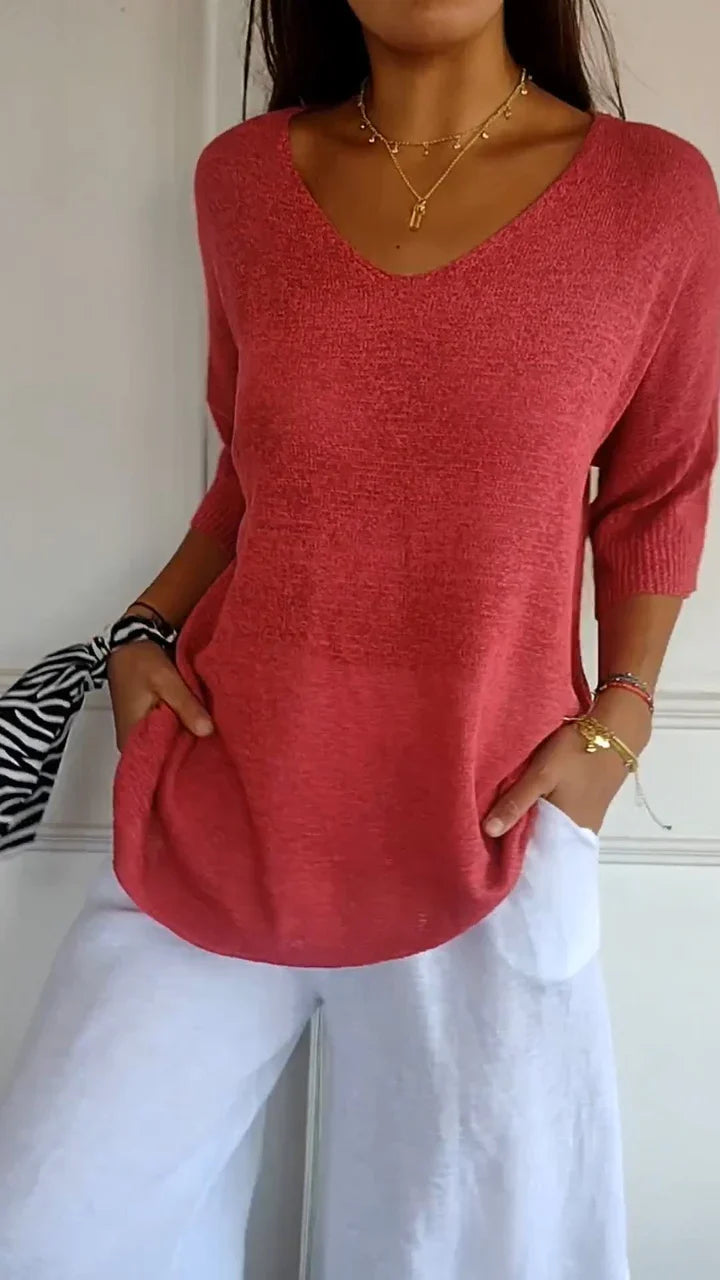 Elegant dame V-hals strikket top i tidløs monokrom stil, perfekt til hverdag og alsidige looks.