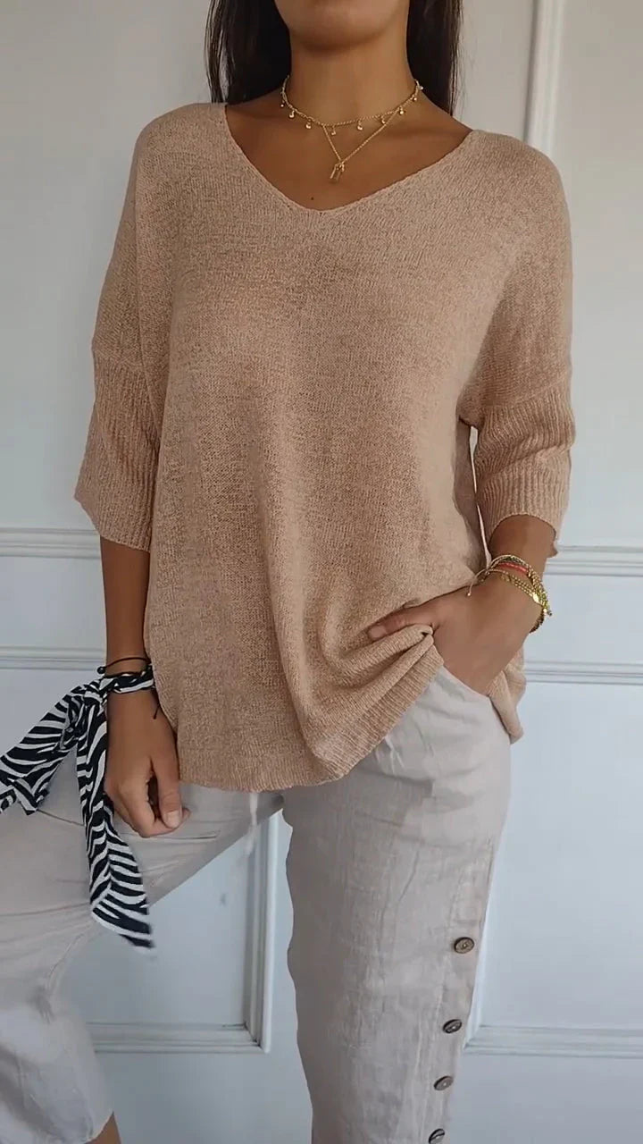 Dame monokrom V-hals strikketop. Tidløst design, perfekt til alsidig styling i sommer og efterår.