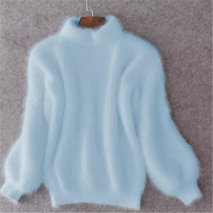 Elegant dame vintage striktrøje i blød, farverig strik for tidløs komfort og stil.
