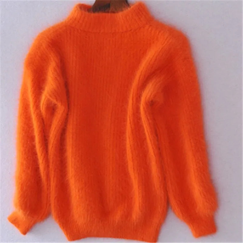 Elegant vintage kvindetrøje i blød strik. Perfekt til både hverdag og fest, med tidløs stil.