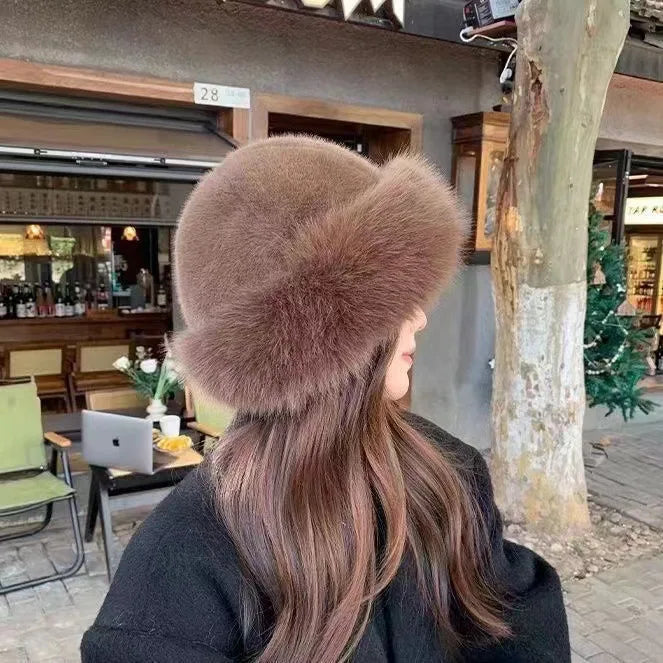 Alsidig elegant dame vinterhue. Perfekt stilfuldt accessory der holder dig varm og chic hele vinteren.