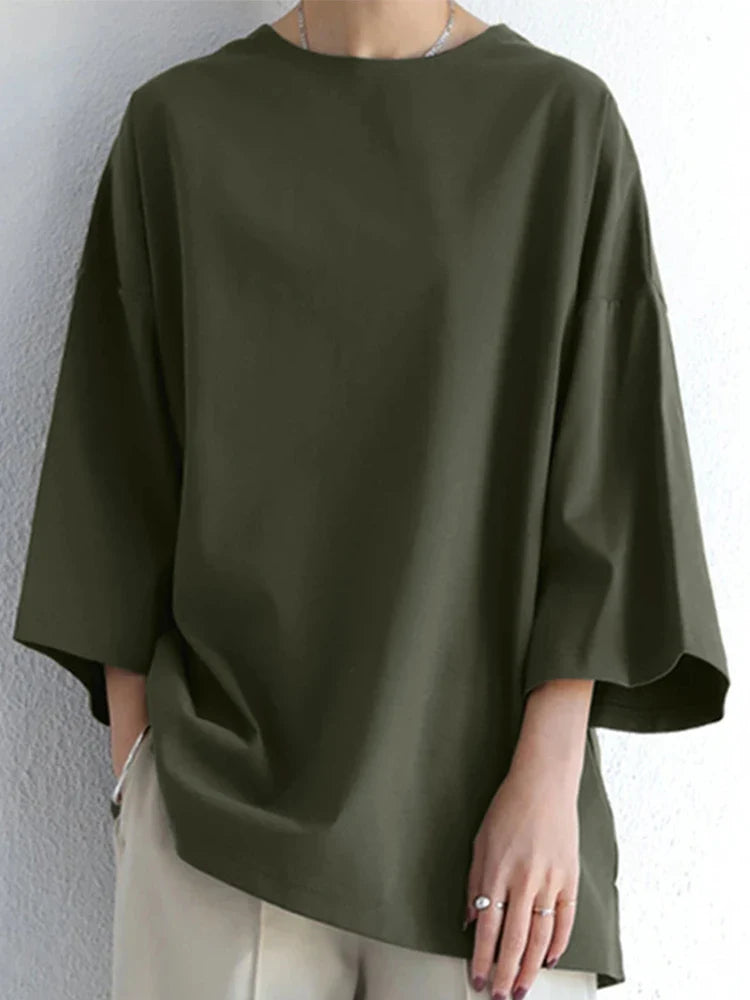 Elegant damebluse i løs pasform med lange ærmer for ultimativ hverdagskomfort. Tidløs stil.