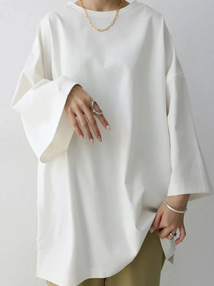 Grøn/khaki damebluse, løs pasform og lange ærmer. Perfekt til komfortabel og stilfuld hverdag.