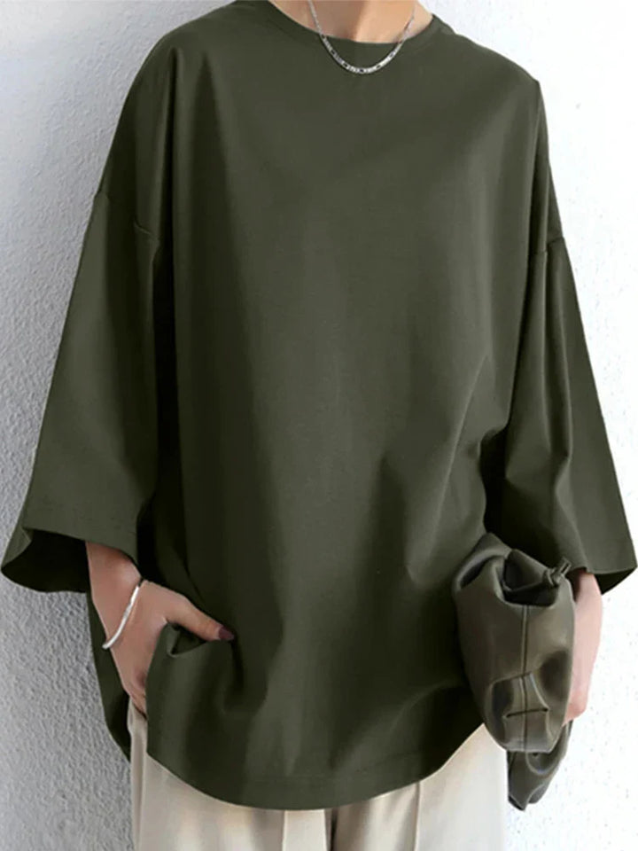 Komfortabel damebluse med elegante lange ærmer og løs pasform. Perfekt som hverdagstøj.