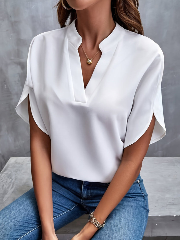 Hverdagsklar elegant damebluse, perfekt som en behagelig top med flatterende pasform.