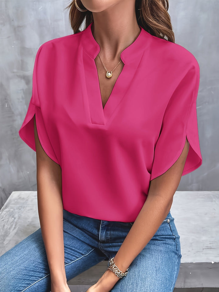 Smuk langærmet damebluse med elegant design, flatterende for alle kropstyper, perfekt til sommer.