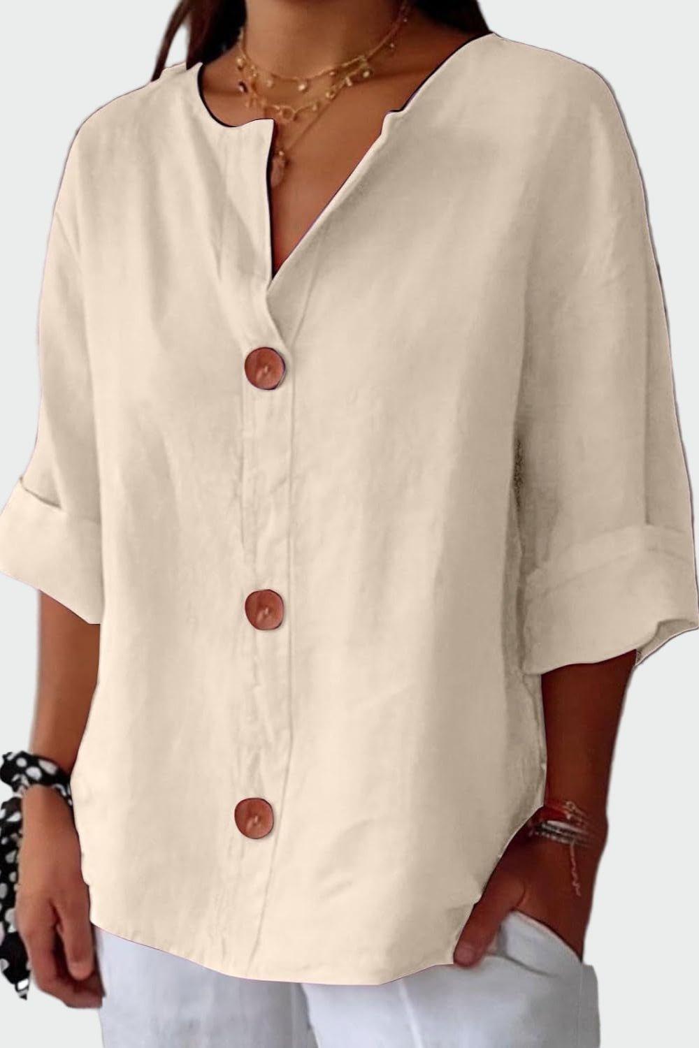 Elegant damebluse med løs pasform og knapper. Komfortabel og stilfuld til hverdag.