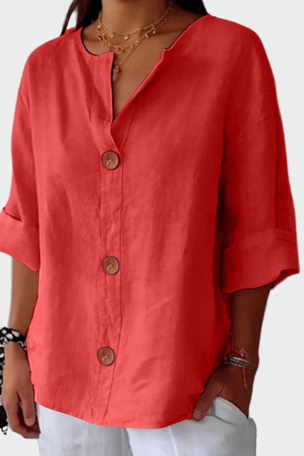 Elegant damebluse i løs pasform med stilfulde knapper. En tidløs og komfortabel forårsbluse.