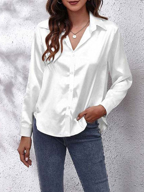 Elegant bluse til damer, perfekt til fest og kontor, med glansfuldt look og trendy frontknude. Langærmet design.