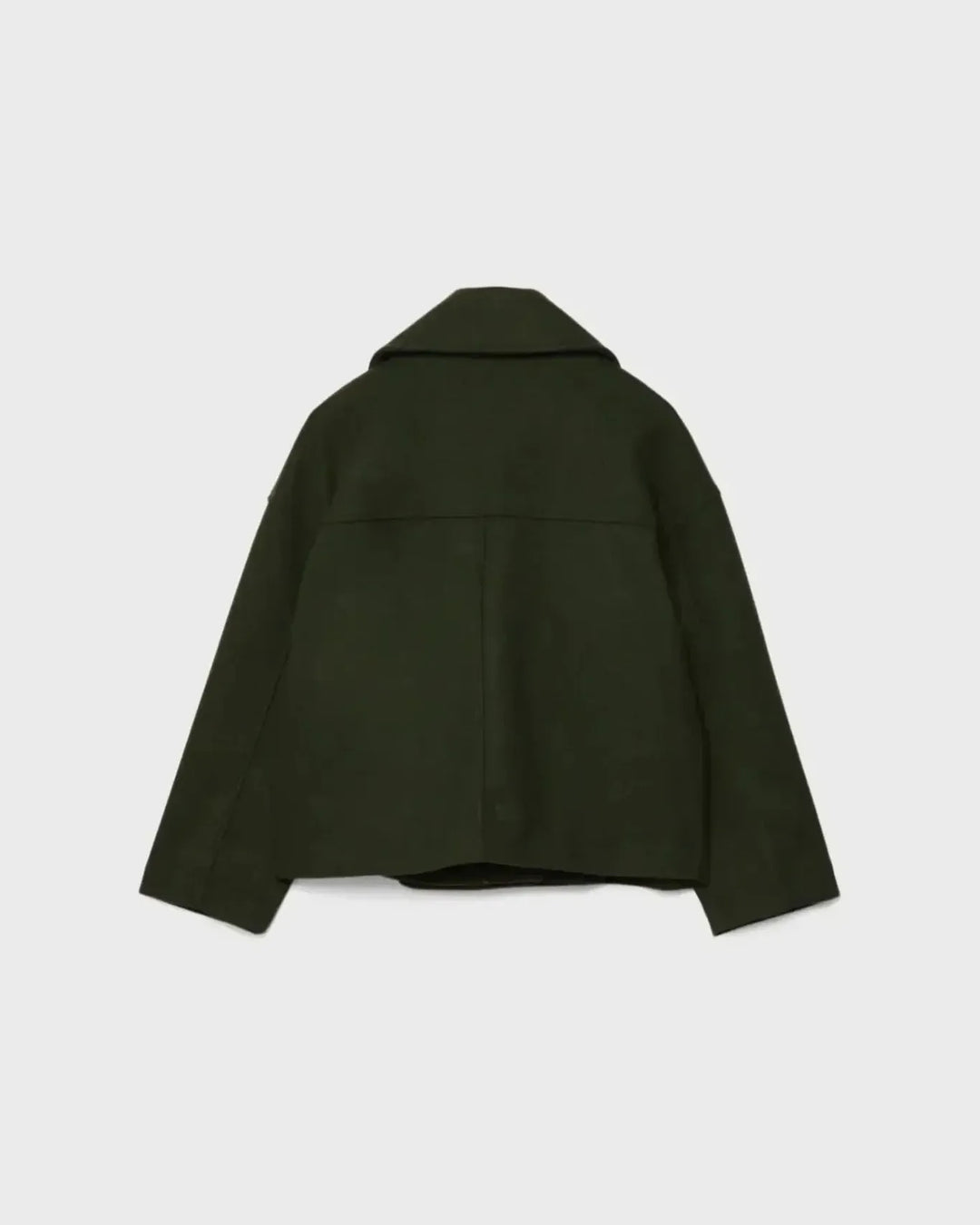 Sideprofil af elegant dobbeltbrystet kvindejakke, kort blazer i klassisk stil.