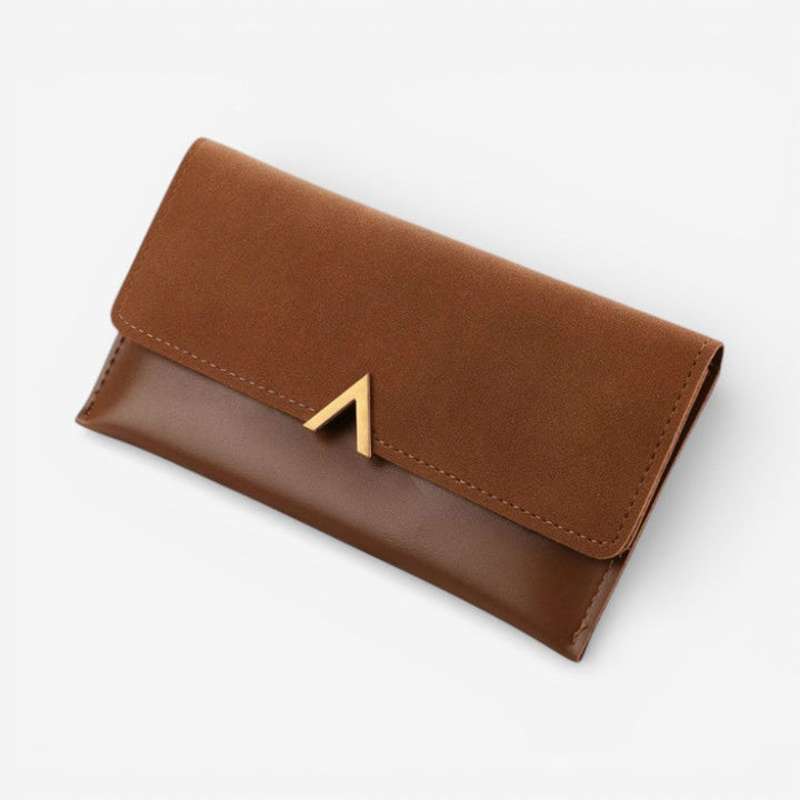 Kompakt dametaske med elegant design og robust lukning. Ideel accessory til den modebevidste kvinde.