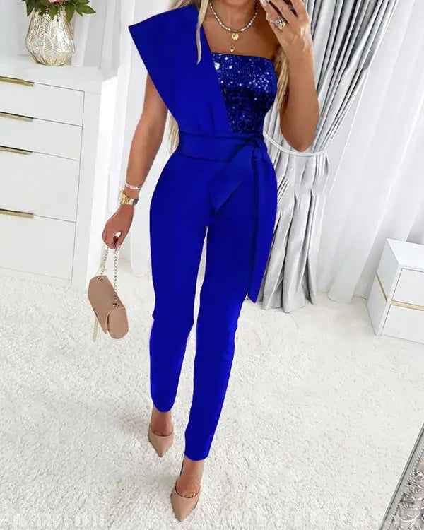 Elegant pailletjumpsuit til kvinder med one shoulder, ideel til fest og glamour.