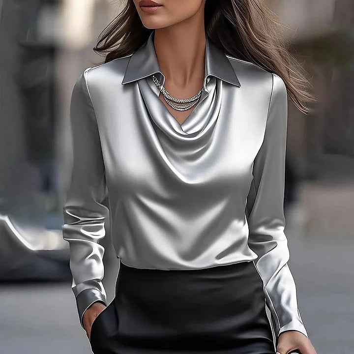 Modebevidst kvindebluse, Jonna, med elegant V-hals. Langærmet top der er behagelig og chic.