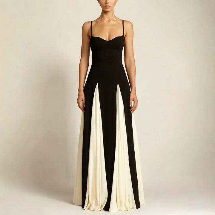 Elegant lang aftenkjole til kvinder med kontrastpaneler. Perfekt til formelle begivenheder.