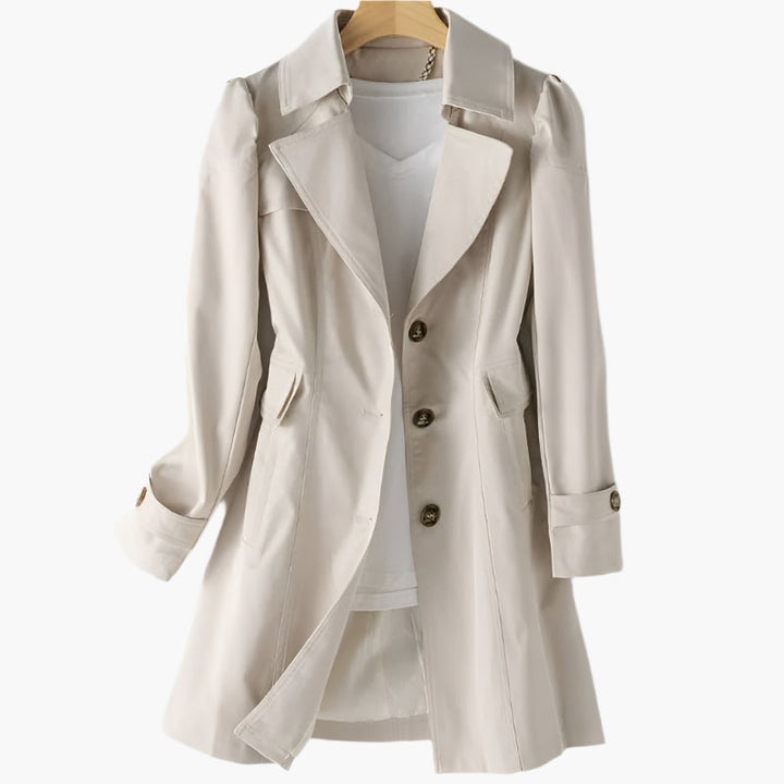 Elegant lang dame trenchcoat til efterår. Klassisk snit, perfekt som overtøj til kvinder.