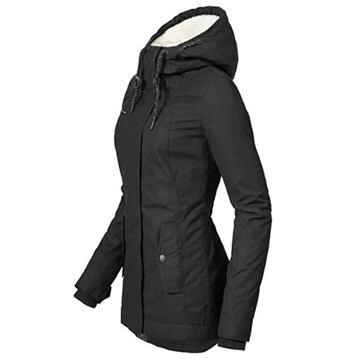 Moderne lang damejakke, varm kvindeparka i elegant design. Perfekt vinterovertøj for et stilrent look.