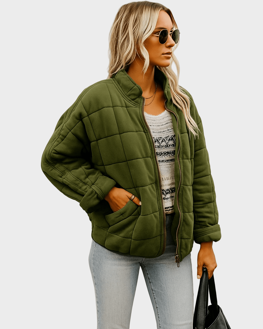 Elegant letvatteret damejakke i sort, ideel til efterår og vinter. Moderne og letvægts design.