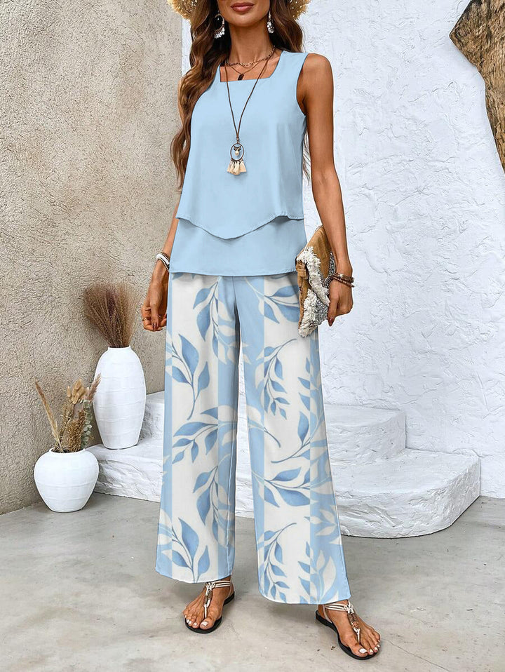 Elegant Mira todelt sæt til kvinder med unikt planteprint og firkantet hals. Perfekt sommer outfit.