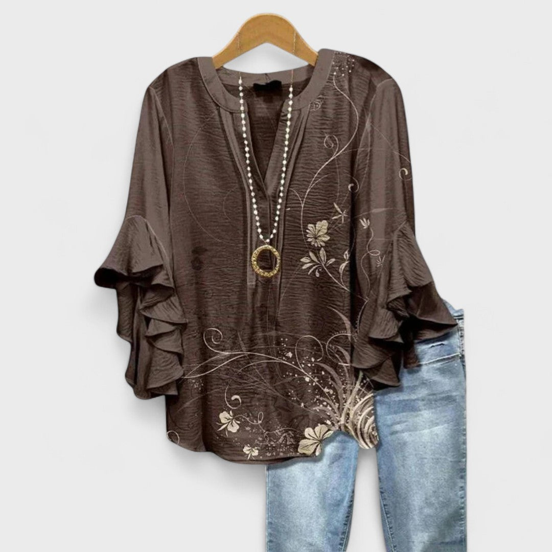 Letvægts damebluse med elegant design, ideel som komfortabel sommerbluse for kvinder.