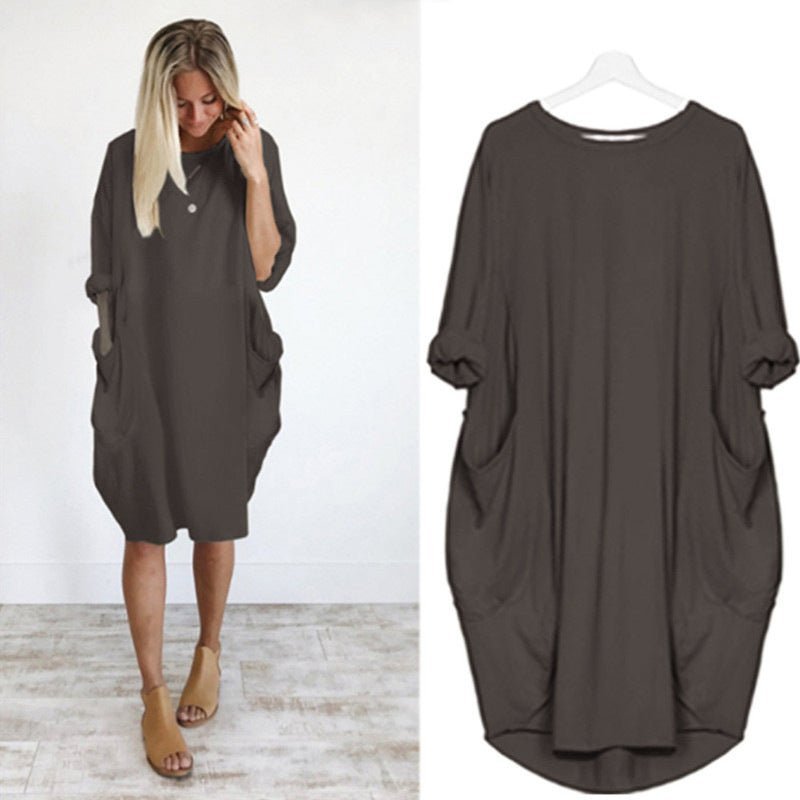 Farverig plus size kjole med lommer. Komfortabel løs pasform, perfekt som fritids- eller sommerkjole.