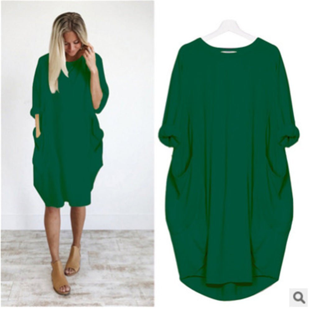 Alsidig plus size damekjole med lommer. Elegant stil og løs pasform til mange lejligheder.