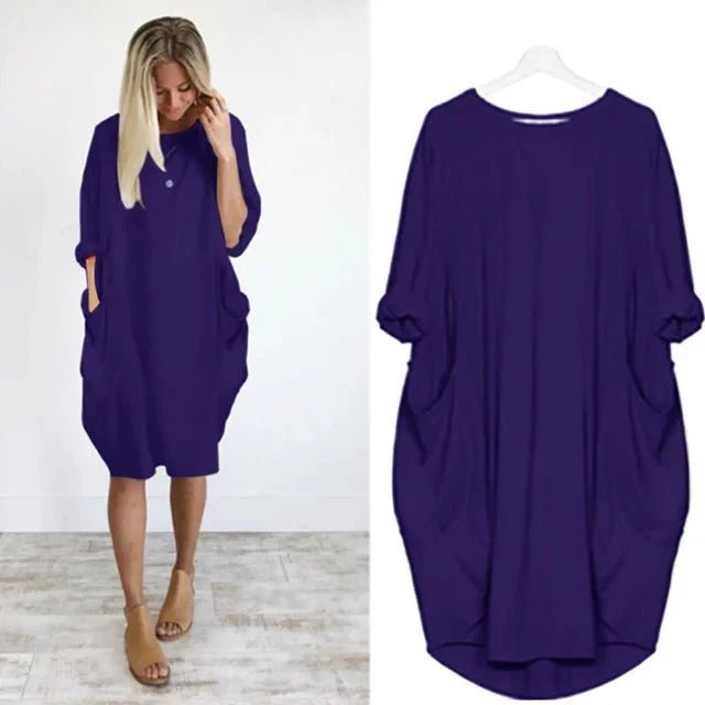 Moderne plus size kjole med lommer, løs pasform og et elegant snit. Ideel til den stilbevidste kvinde.