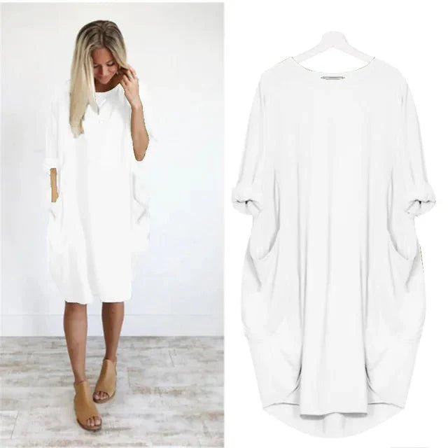 Plus size hverdagskjole med praktiske lommer. Løs pasform og elegant stil til alle kropsformer.