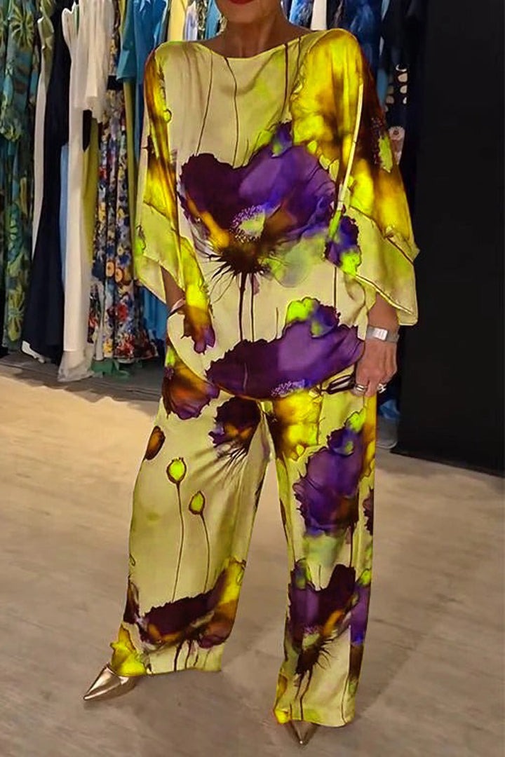 Stilfuldt satin loungewear sæt til kvinder. Perfekt buksesæt til afslapning og elegance.