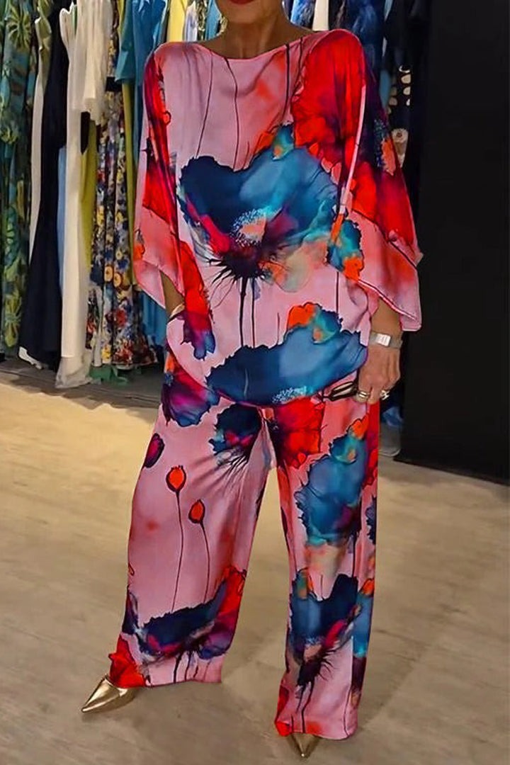 Komplet satin outfit sæt til kvinder i forår/sommer stil. Blomsterprint for et frisk look.