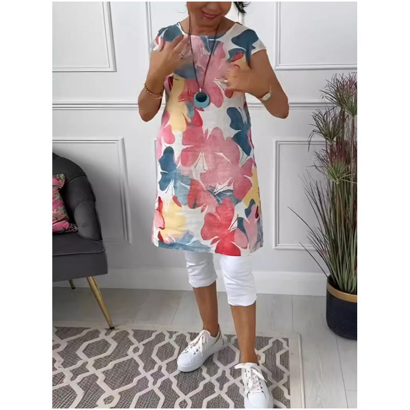 Stilfuld dametøjs kjole: elegant skjortekjole med sommerfugleprint, knælang for komfort.