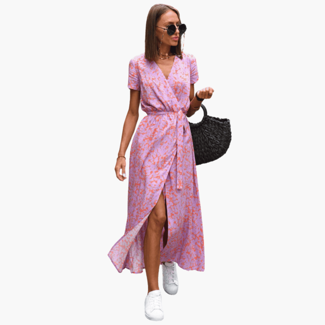 Elegant slå-om-kjole til kvinder med flatterende pasform. Komfortabel, tidløs og alsidig damekjole til fest, sommer & hverdag.