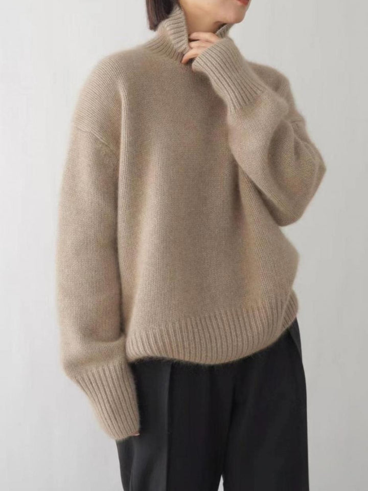 Blå dame rullekravetrøje, perfekt til et sofistikeret og komfortabelt look.