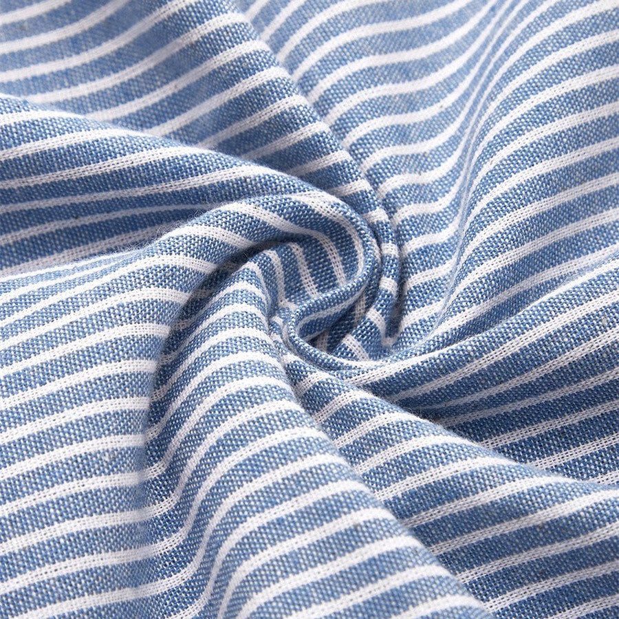 Komfortabel stribet midi kjole til kvinder. Trendy hverdagskjole med 3/4 ærme, ideel til sommer. Elegant og stilfuld.