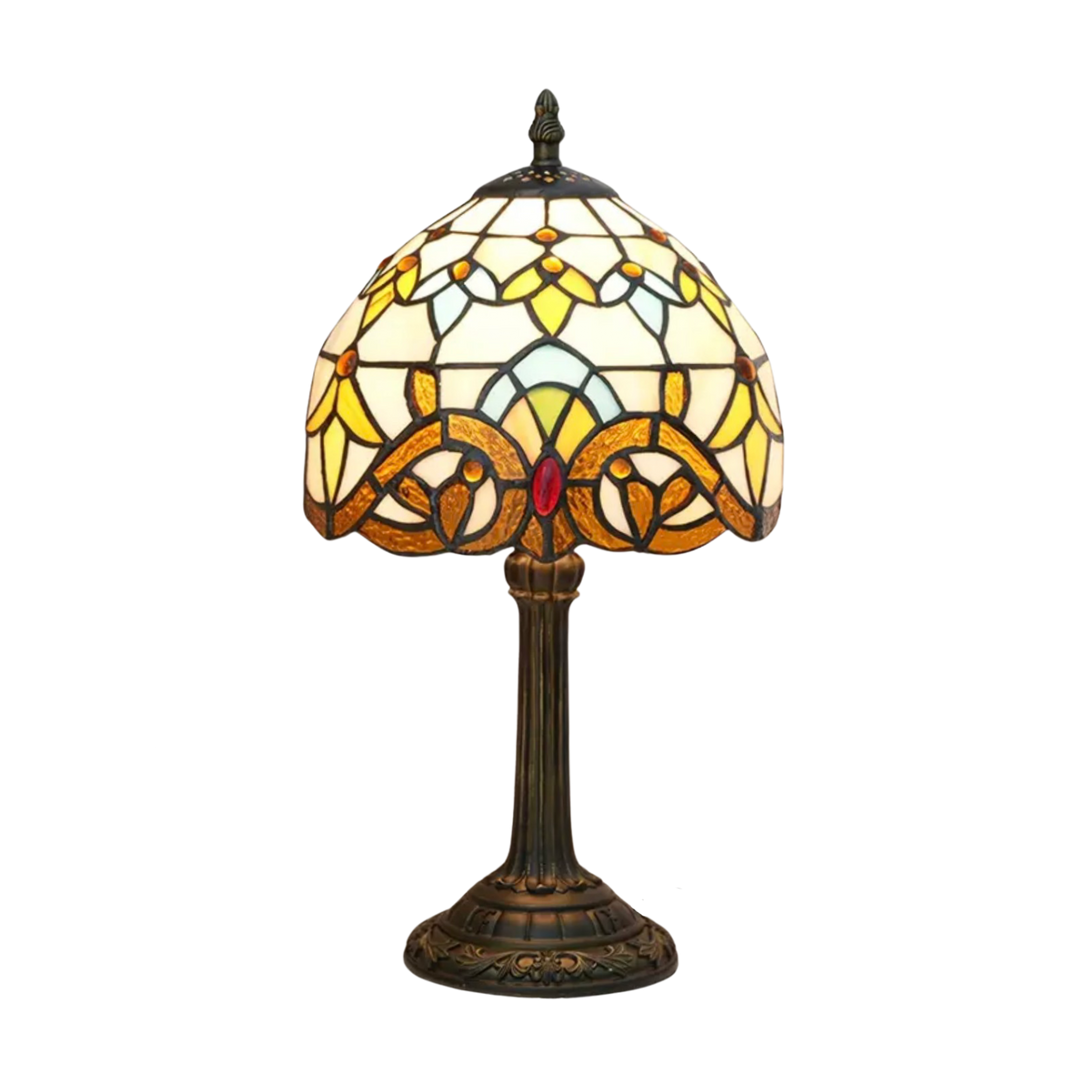 Elegant Tiffany bordlampe med farvet glas, perfekt til hyggelig retro belysning i stue eller soveværelse.