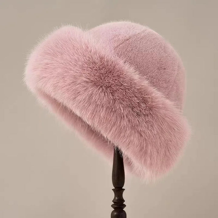 Elegant, varm dame pelshue i luksuriøs stil. Perfekt vinterhue til kvinder.