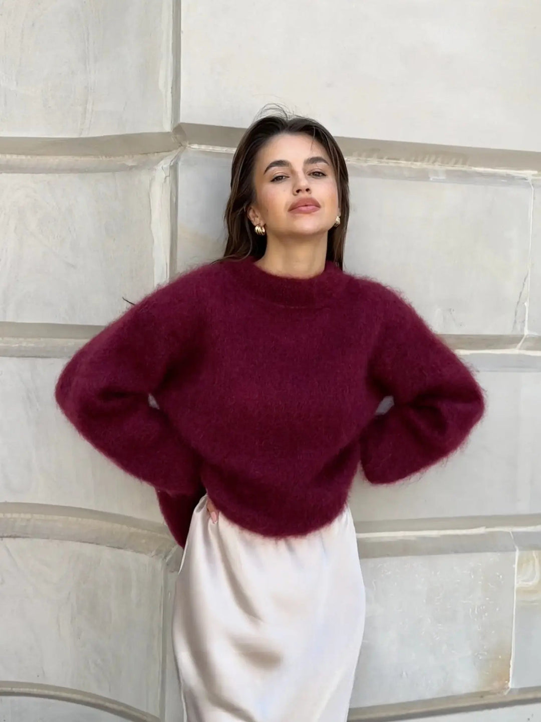 Elegant, varm damepullover i luksuriøs strik. Ideel til vinter og stilfuld hverdag.