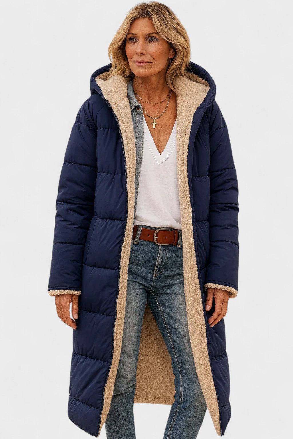 Komfortabel vendbar overgangsfrakke, stilfuld og elegant for kvinder. Perfekt til køligere dage.