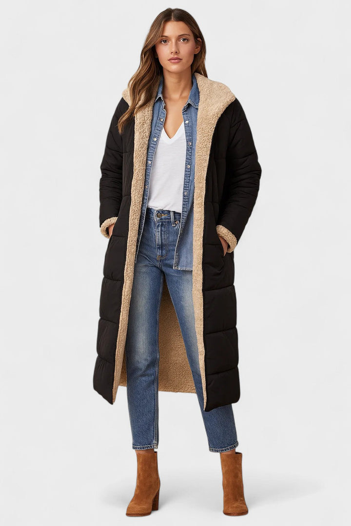 Klassisk damefrakke, vendbar design, luksuriøs og komfortabel. Ideel til modebevidste kvinder.
