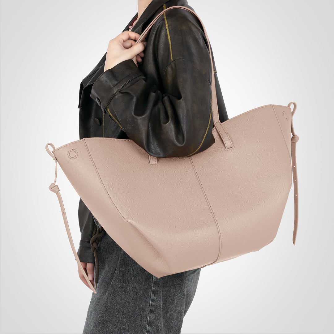 Stilfuld beige vintage skuldertaske til kvinder. Klassisk design med god organisering til hverdagsbrug.
