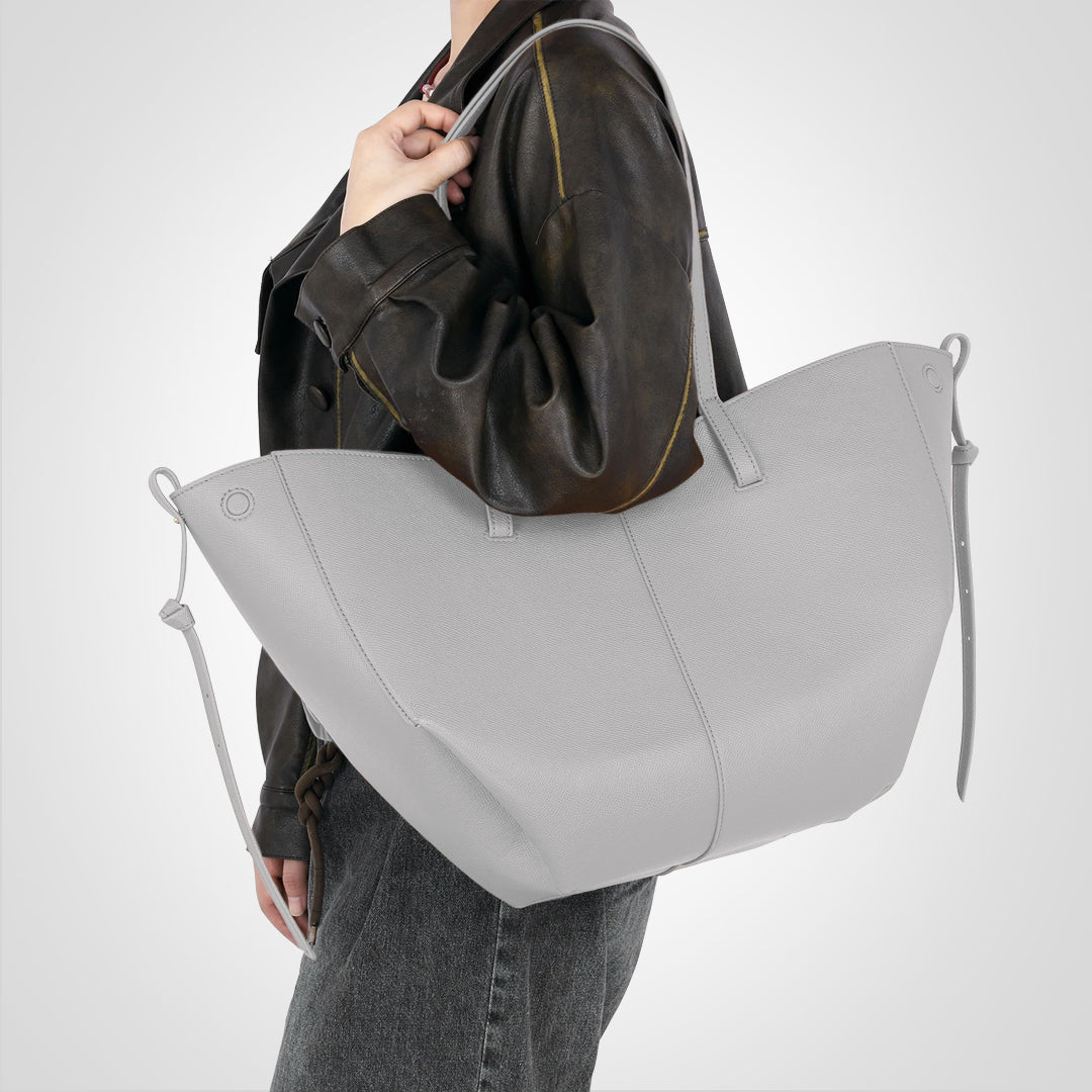 Lysegrå vintage skuldertaske til kvinder, en stilfuld og organiseret mode accessories til enhver anledning.