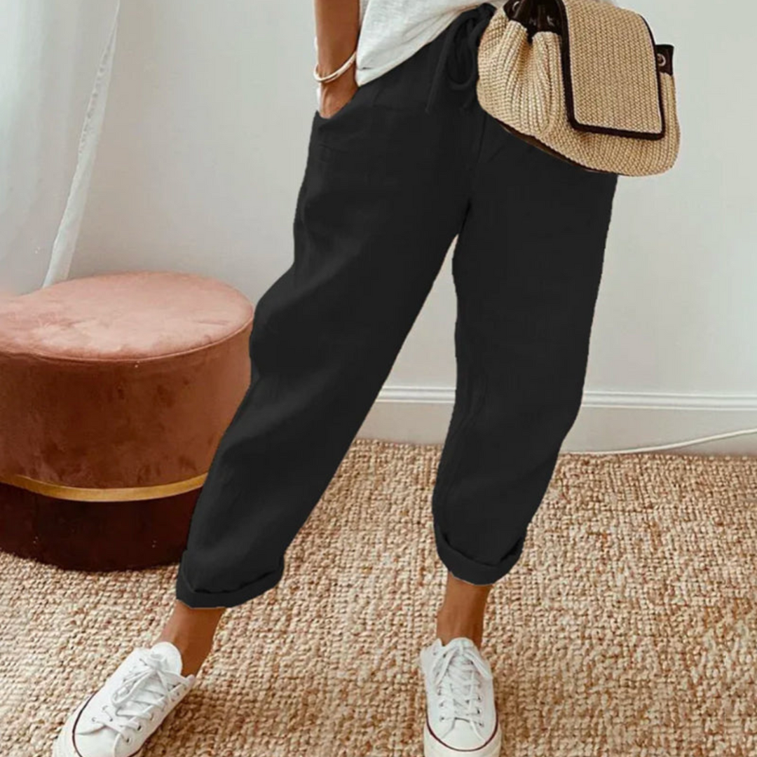 Fashionable dame hørbukser med elegant løs pasform, velegnet til både casual og festlig kvindemode.