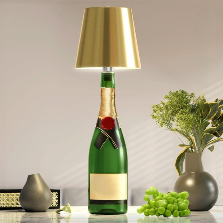 Elegant, dæmpbar LED-flaskelampe i glas, bærbar med touch-betjening, i gulddesign til alsidig brug.