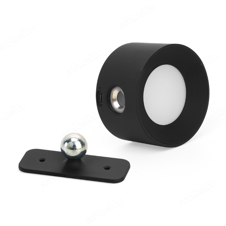 Elegant trådløs væglampe i sort set fra siden, med dæmpbart LED-lys og 360° drejelig funktion for fleksibel positionering.