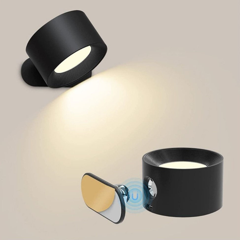 Elegant trådløs væglampe i sort set fra siden, med dæmpbart LED-lys og 360° drejelig funktion for fleksibel positionering.