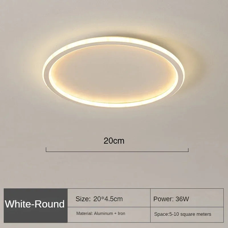 Elegant skandinavisk LED-loftslampe, dæmpbar, rund, i moderne spisestue, varmt hvidt lys, 40 cm diameter.
