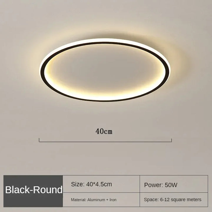 Elegant skandinavisk LED-loftslampe, dæmpbar, rund, i moderne spisestue, varmt hvidt lys, 40 cm diameter.