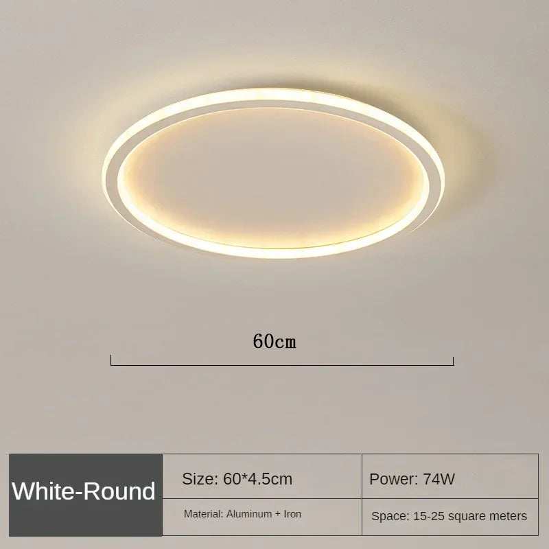 Elegant skandinavisk LED-loftslampe, dæmpbar, rund, i moderne spisestue, varmt hvidt lys, 40 cm diameter.