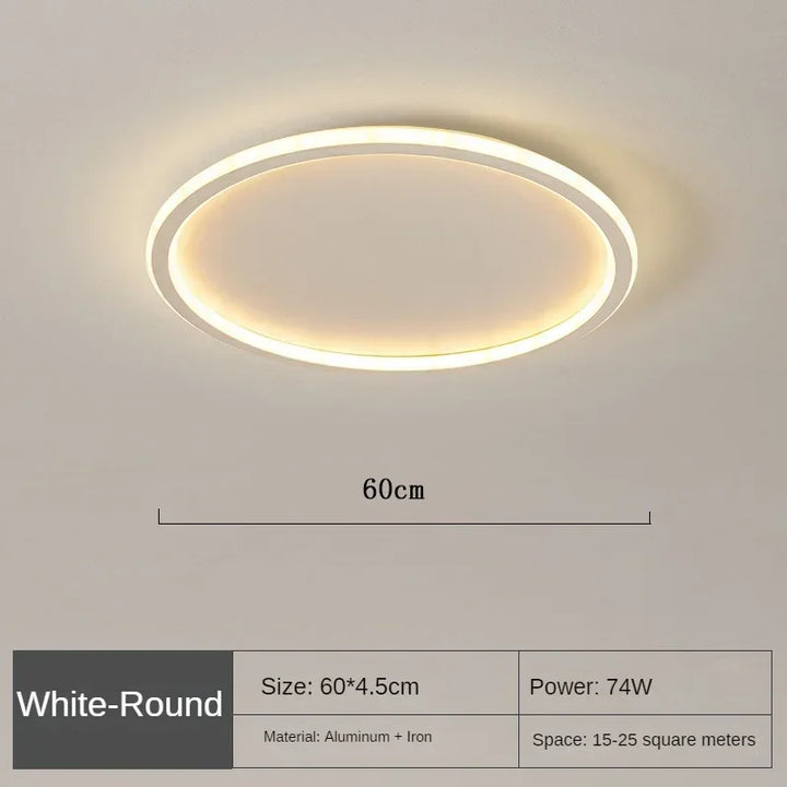 Elegant skandinavisk LED-loftslampe, dæmpbar, rund, i moderne spisestue, varmt hvidt lys, 40 cm diameter.