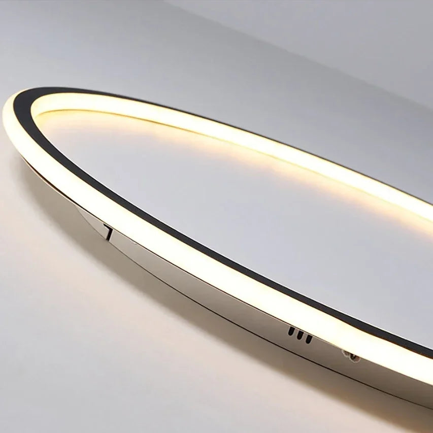 Elegante skandinavische LED-Deckenleuchte, dimmbar, rund, in modernem Esszimmer, warmweißes Licht, 40 cm Durchmesser.